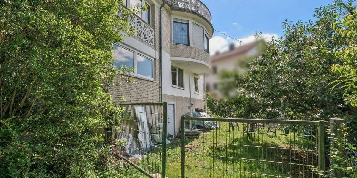 Vielseitiges Zweifamilienhaus mit Ausblick und Garten - Mehrfamilienhaus, Wohnhaus Weilrod | Angebot:21142457