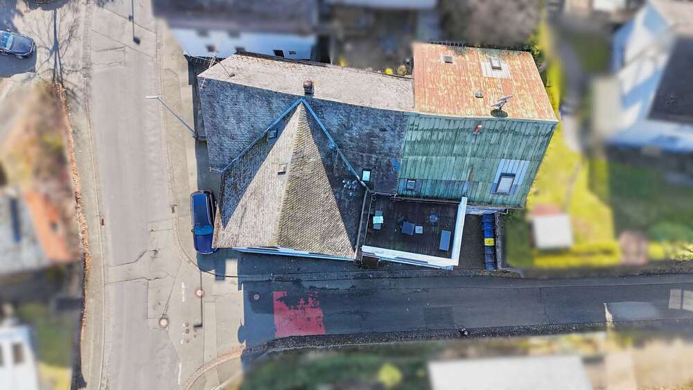 Vier Einheiten - Eine Chance ! Solides Investment in Herborn OT - Mehrfamilienhaus, Wohnhaus Herborn | Angebot:26738029