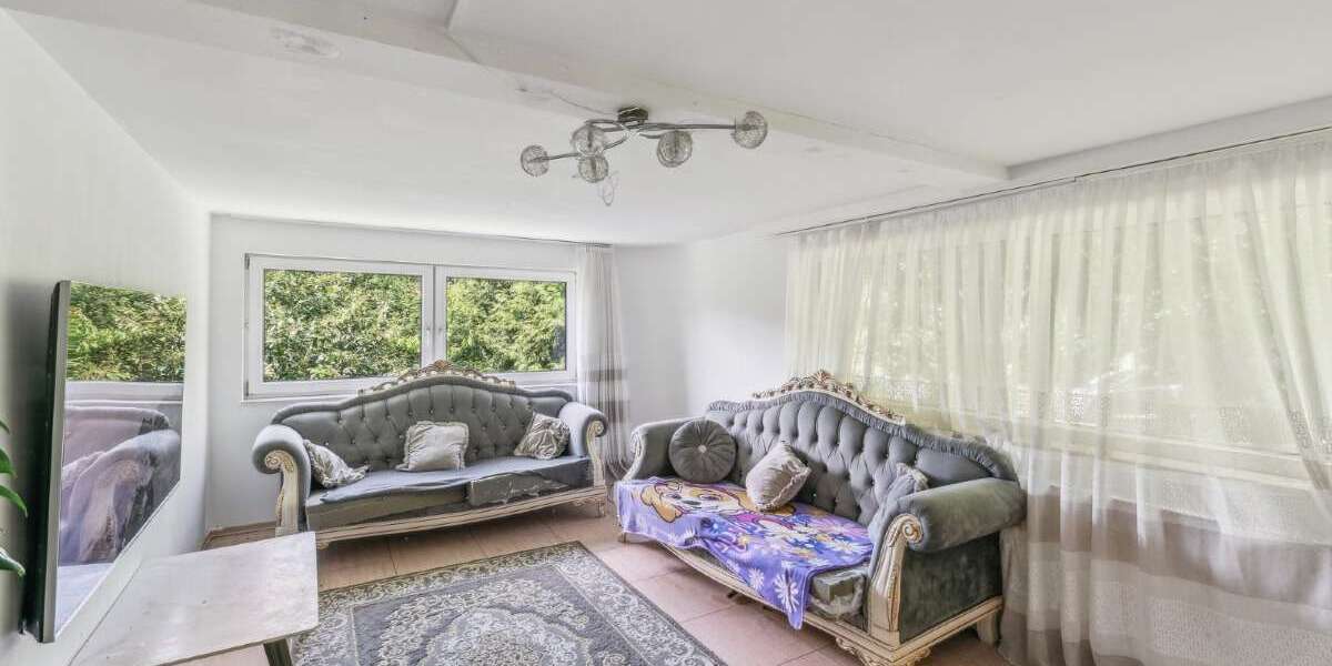 Vielseitiges Zweifamilienhaus mit Ausblick und Garten - Mehrfamilienhaus, Wohnhaus Weilrod | Angebot:21142457